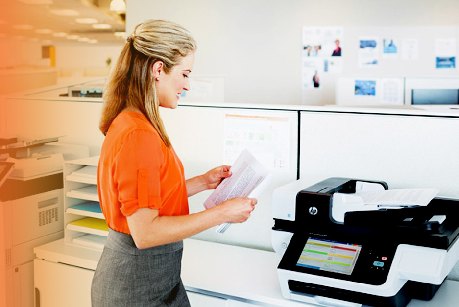 Woman in Office Setting Standing at HP Printer